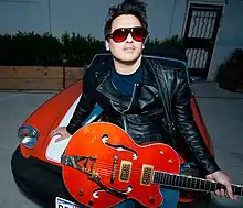 Darlington with his Gretsch 6120 guitar "Dolly", named after Dolly Parton