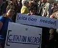 Chance meet of two [citation needed] signs at the rally