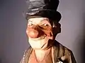 Closeup of face Woodcarving of a hobo By Carl Johan Trygg circa 1940s