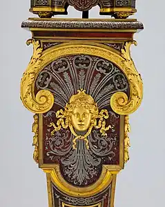 Baroque mascaron on the pedestal of a clock, by André Charles Boulle, c.1690, gilt wood, Metropolitan Museum of Art, NYC