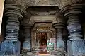 The inside view of Akkana Basadi, Shravanabelagola(1181 A.D.); Parshvanatha (centre), Yaksha Dharanendra (left) and Yakshini Padmavati (right)