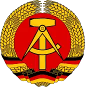 A compass on the former National Emblem of East Germany (former German Democratic Republic).