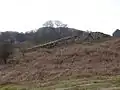 The remains of the highest incline above Dolgarrog. The former winding house can also be seen (top right) as can the former loco shed (top left).