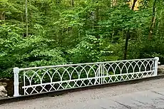 Interlocking Gothic arches on bridge over India Brook