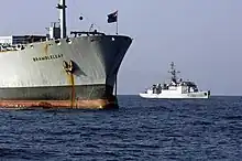 A D'Estienne d'Orves-class aviso near RFA&nbsp;Brambleleaf prior to performing a "visit, board, search and seizure" operation