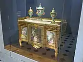 Commode of Madame du Barry; by Martin Carlin (attribution); 1772; oak base veneered with pearwood, rosewood and amaranth, soft-paste Sèvres porcelain, bronze gilt, white marble; 87 x 119&nbsp;cm; Louvre