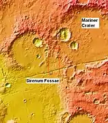 MOLA context image for the series of three images to follow of gullies in a trough and nearby crater.