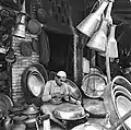 Coppersmith at Suq Al-Safafir, Baghdad, 1962