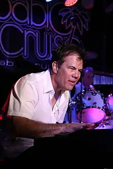 Lerios performing in July 2009