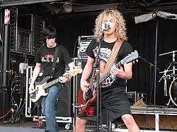 Josh McDowell (left) and Forrest French perform in 2009