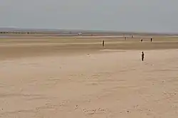 View out to sea, with the Iron Men in view