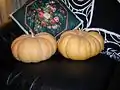 A pair of Cheese Pumpkin fruit