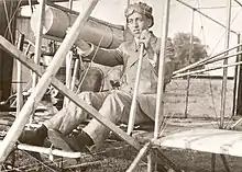 Day Jr. in a biplane, 1914