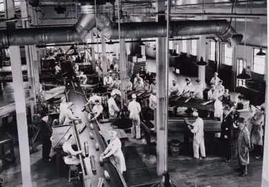 Line 3 - workers assemble 3.7 calibre anti-aircraft shells