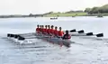 Rowers in a coxed eight
