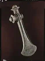 Nordic Bronze Age ceremonial axe, blade pointed down.