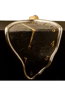 A silver melting clock with black background and golden clock hands.