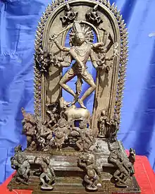 In the Shiva temple of Melakadambur is a rare Pala image that shows the ten-armed Nataraja dancing on his bull, Nandi