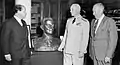 De Weldon (left) presents his bust of U.S. Navy Admiral of the Fleet Chester W. Nimitz to the Naval War College on 5 June 1964. President of the Naval War College Vice Admiral Bernard L. Austin (center) and retired U.S. Marine Corps Lieutenant General Keller E. Rockey look on.
