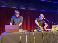 Electronic group "death's dynamic shroud" performing live