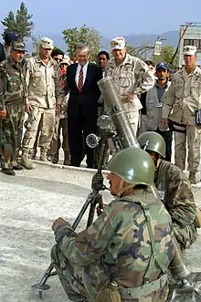 Rumsfeld with Major General Karl Eikenberry during a visit to Afghan Army Military Training Center in Kabul, Afghanistan on May 1, 2003