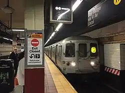 A "Q" train arriving on the Coney Island-bound platform