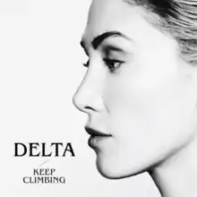 A black-and-white side profile portrait of a woman, with her hair pulled back from her face, with the words "Delta" and "Keep Changing" written.