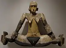 Gable figure (dilukái); late 19th century-early 20th century; painted wood; height: 65.2&nbsp;cm (25.mw-parser-output .frac{white-space:nowrap}.mw-parser-output .frac .num,.mw-parser-output .frac .den{font-size:80%;line-height:0;vertical-align:super}.mw-parser-output .frac .den{vertical-align:sub}.mw-parser-output .sr-only{border:0;clip:rect(0,0,0,0);clip-path:polygon(0px 0px,0px 0px,0px 0px);height:1px;margin:-1px;overflow:hidden;padding:0;position:absolute;width:1px}2⁄3 in.); from Palau, by Belauan people; Metropolitan Museum of Art (New York City)