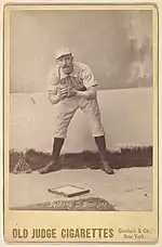 Doc Bushong on an 1888 Old Judge baseball card, showing glove.