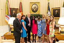 A picture of US President Donald Trump meeting two of the Chibok schoolgirls in June 2017