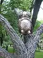 Owl sculpture of wrought "Tree of life" composition