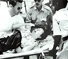 One of the hostages being evacuated by plane