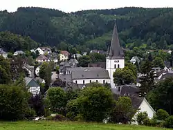 View of Drolshagen towards south from Papenberg (417 m). St. Clement's Church dominates the skyline.