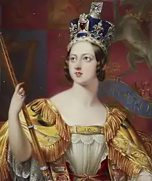 Victoria wears her crown and holds a sceptre.