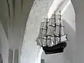 A model ship (probably thanking help during a storm) hanging in a Söderköping church.