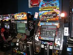 DrumMania V6 (left) and GuitarFreaks V6 (right) machines