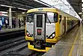 A E257-500 series EMU on a Shinjuku Sazanami service in May 2010 at Akihabara Station
