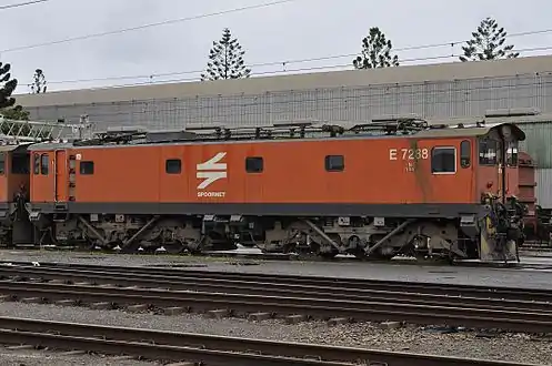 No. E7288, left side, in Spoornet orange livery and inscribed 7E5 at Richards Bay, KwaZulu-Natal, 16 December 2010