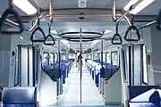 Passenger rows of seats inside intermediate car of Ivolga-1.0.