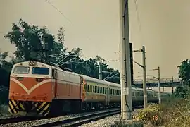 EMU100 with assisting locomotive E338