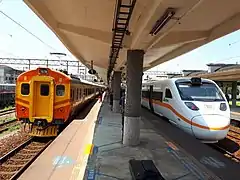 EMU100 with high-speed tilting Taroko TEMU1000 (right)