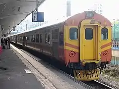EMU100 on yellow duck festival extra train duty at Keelung