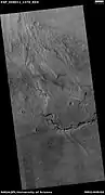Wide view of upper plains unit breaking down into brain terrain, as seen by HiRISE under HiWish program