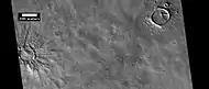 Layered features in craters, as seen by HiRISE under HiWish program