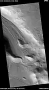 Valley showing Lineated valley fill, as seen by HiRISE under HiWish program Linear valley flow is caused by ice movements.  Location is Casius quadrangle.
