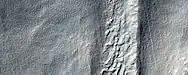 Close, color view of flow, as seen by HiRISE under HiWish program Patterned ground is visible in the photo.