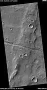 Trough cutting a wrinkle ridge, as seen by HiRISE under HiWish program