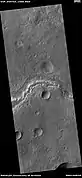 Wide view of light and dark toned layers, as seen by HiRISE under HiWish program