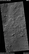 Channel, as seen by HiRISE under HiWish program  Arrows indicate position of channel in this rather dark photo.