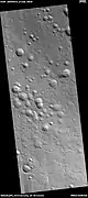 Possible expanded secondary craters, as seen by HiRISE under HiWish program  These craters may have become much wider, as ice left the ground around the rims.